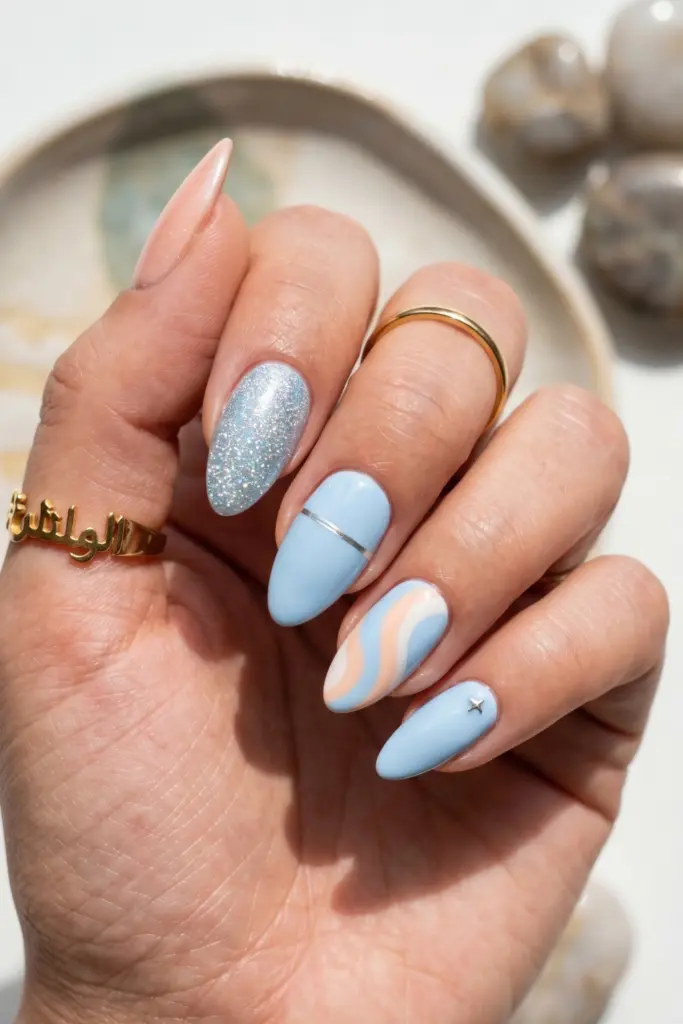 baby-blue-silver-glitter-simple-almond-summer-nails