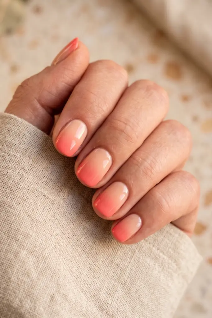 coral-ombre-fade-soft-peach-bright-coral-nails