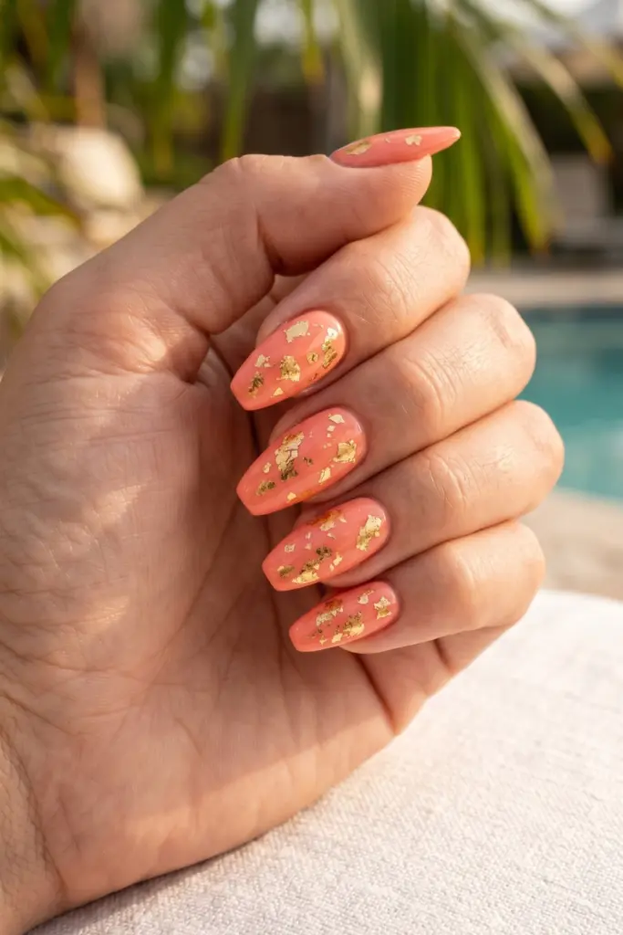 coral-pink-gold-foil-flakes-simple-baddie-summer-nails