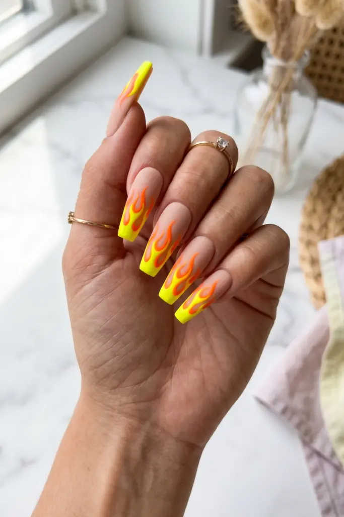 neon-orange-yellow-flames-nude-simple-baddie-summer-nails