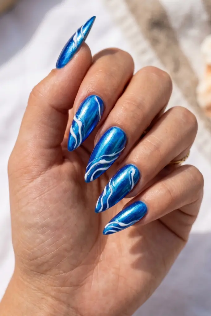 ocean-blue-chrome-wave-stiletto-simple-summer-nails