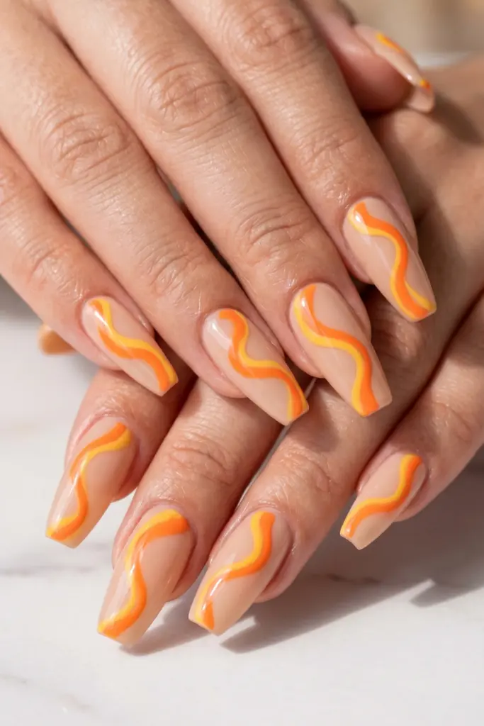 orange-yellow-abstract-swirls-simple-baddie-summer-nails