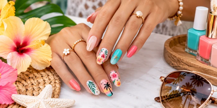 Simple summer nail art design ideas featuring glossy coral, turquoise, pink, floral, tropical leaf, and palm-inspired nail designs with bright summer colors and elegant details.