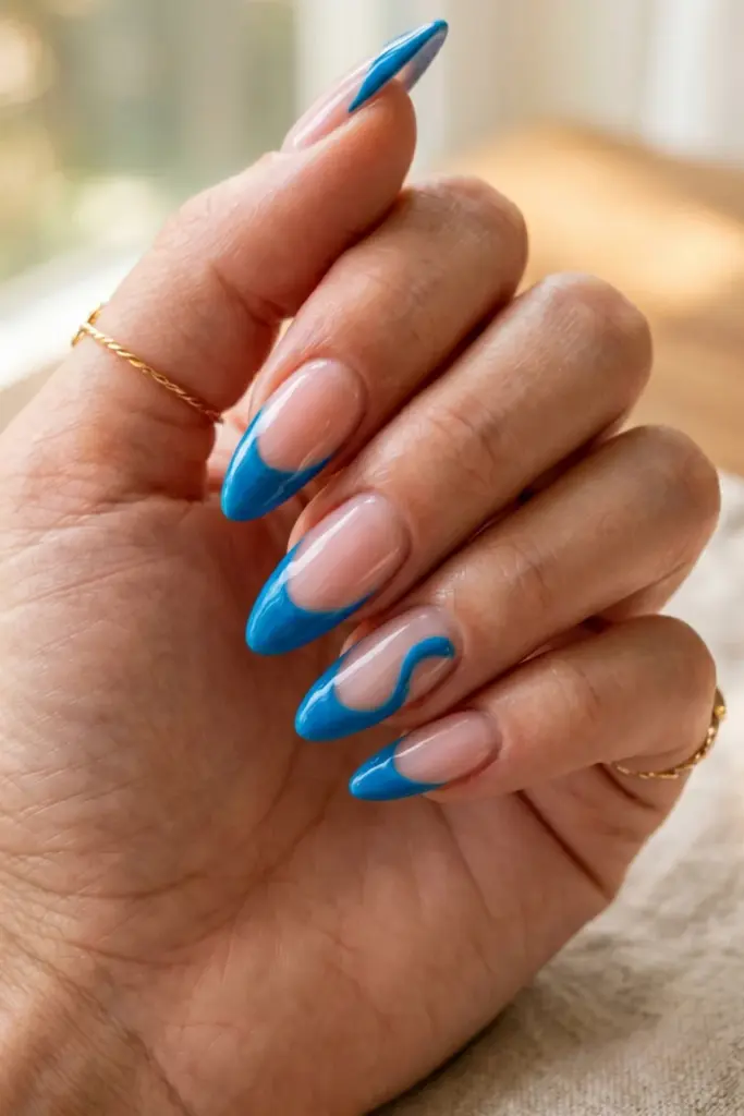 cerulean-wavy-french-tip-blue-abstract-summer-nail-design-ideas