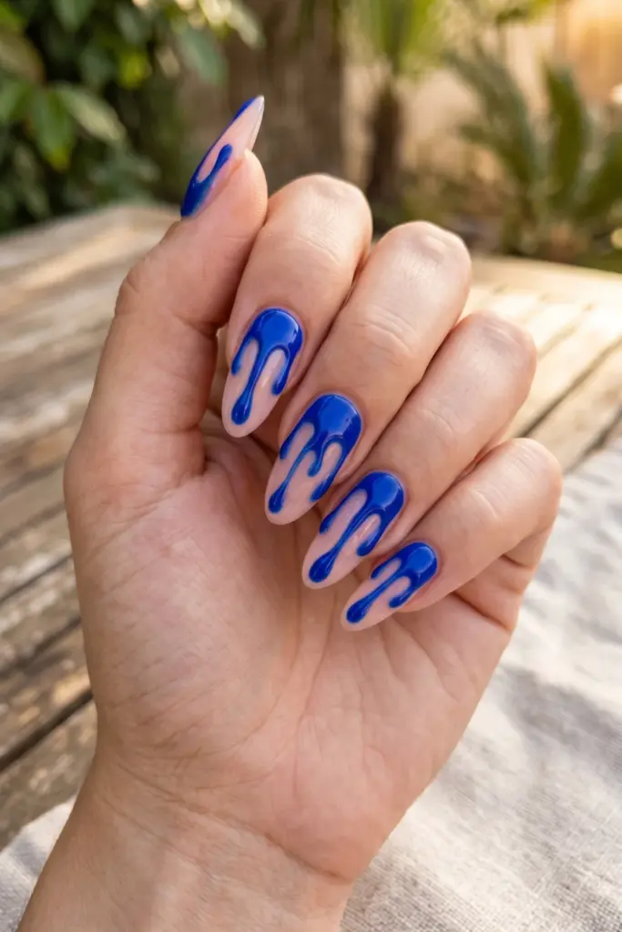 cobalt-drip-art-blue-abstract-summer-nail-design-ideas
