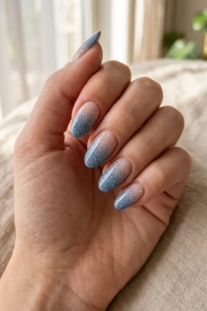 denim-blue-ombre-white-speckles-almond-summer-nails