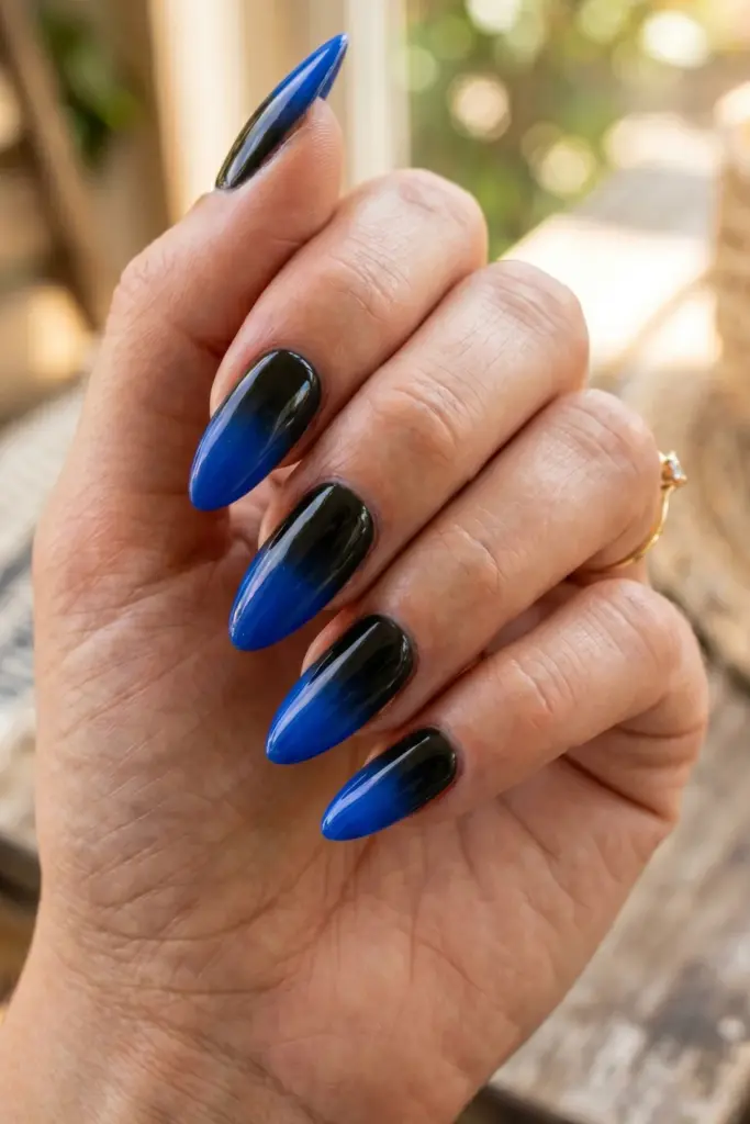 electric-blue-black-ombre-summer-nights-almond-nails