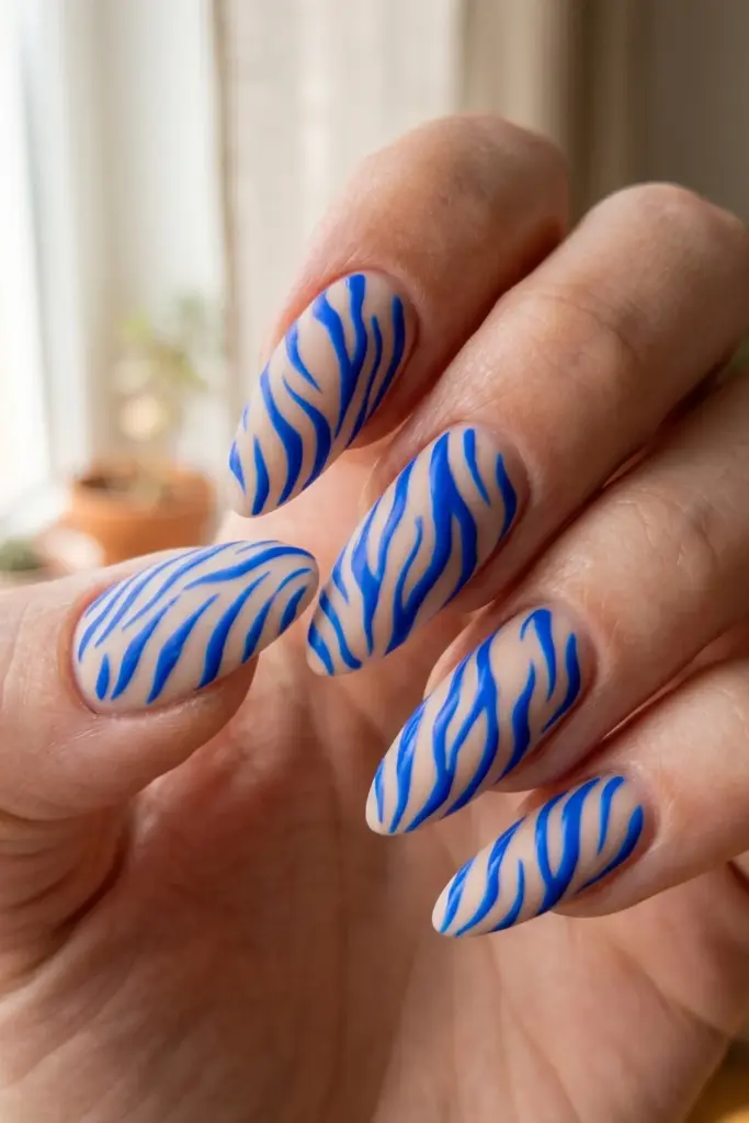 electric-blue-zebra-hybrid-blue-abstract-summer-nail-design-ideas