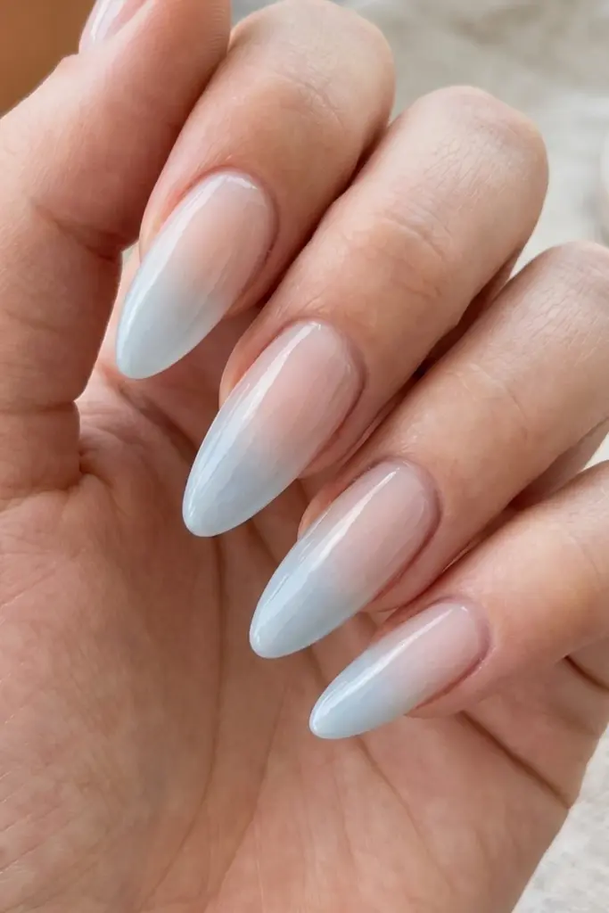 ice-blue-clear-sheer-ombre-almond-summer-nails