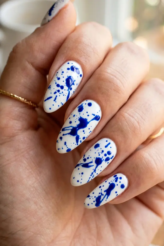 sapphire-splatter-effect-blue-abstract-summer-nail-design-ideas