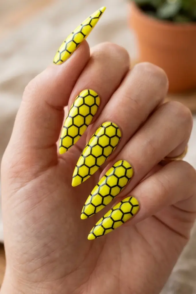 bright-yellow-black-hexagons-stiletto-acrylic-summer-nail-design-ideas