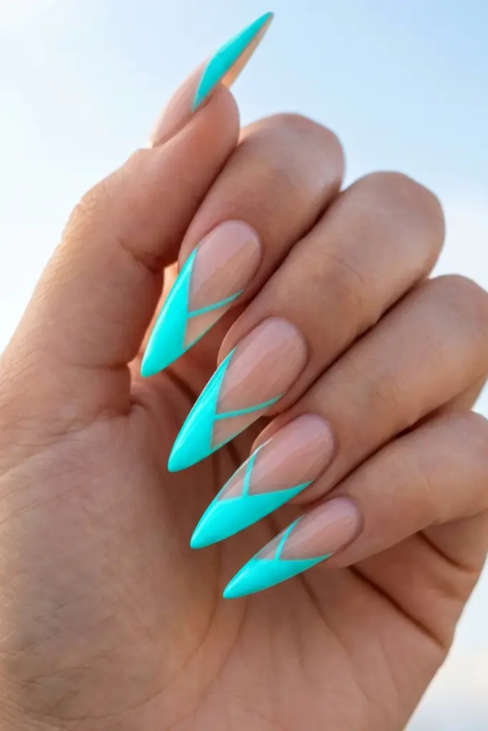 cyan-neon-negative-space-angles-stiletto-acrylic-summer-nail-design-ideas