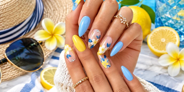 Trendy Fourth of July summer nail color design ideas featuring glossy red, white, and blue nails with festive stars, stripes, glitter accents, and stylish patriotic details.