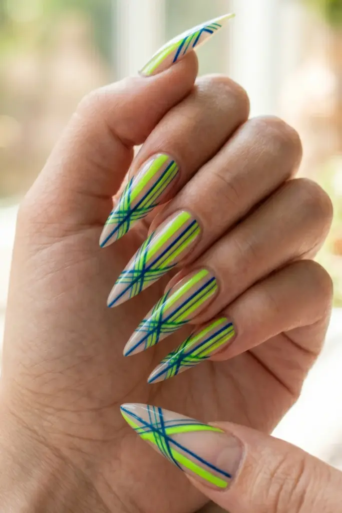 lime-cobalt-blue-intersecting-lines-stiletto-acrylic-summer-nail-design-ideas