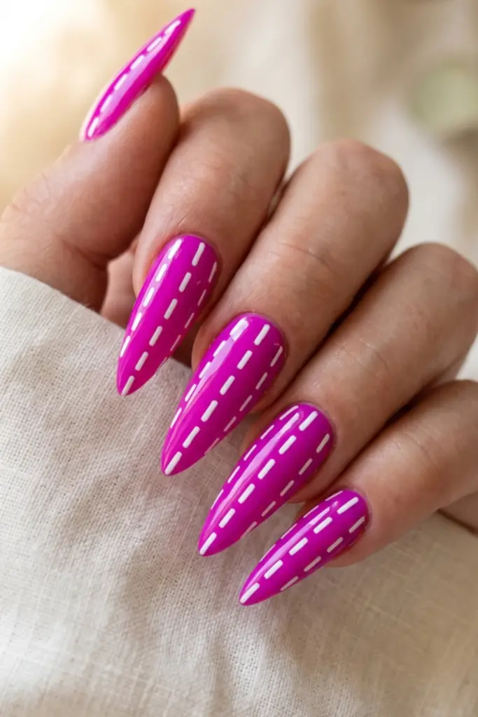 magenta-neon-parallel-dashed-lines-stiletto-acrylic-summer-nail-design-ideas