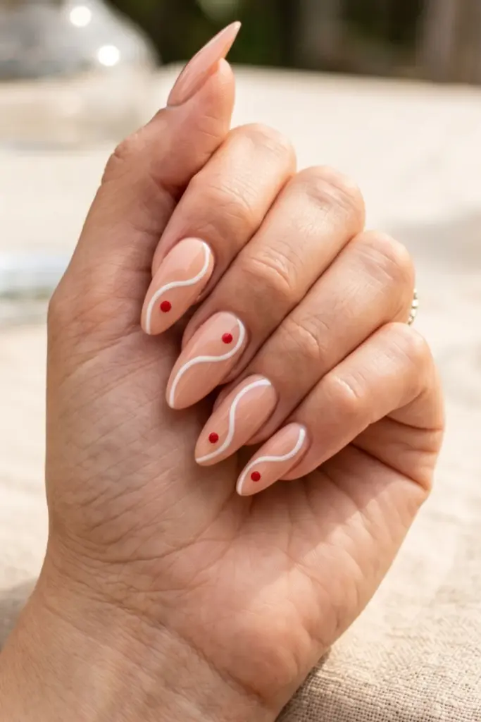 minimalist_patriotic_nails_nude_base_white_wave_red_dot
