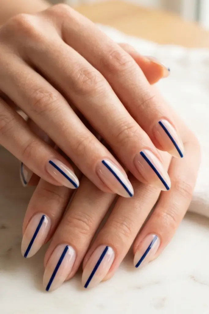 minimalist_patriotic_nails_single_navy_blue_stripe_on_clear