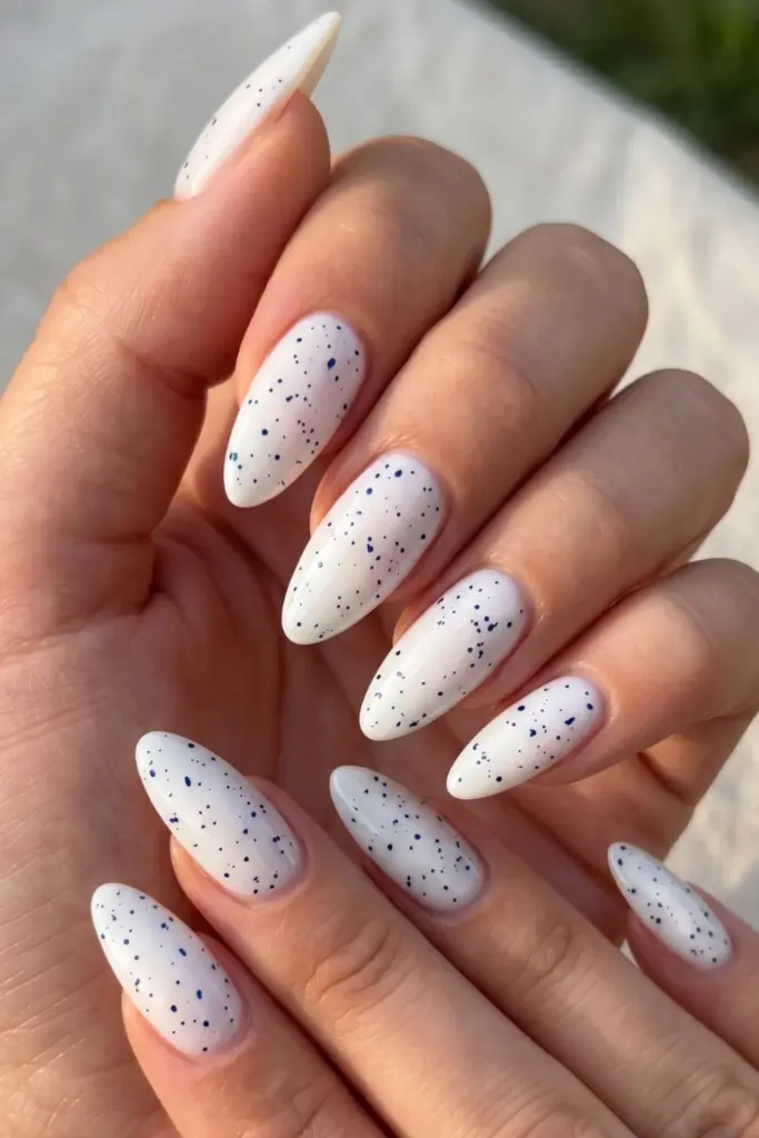 minimalist_patriotic_nails_white_base_with_blue_speckles