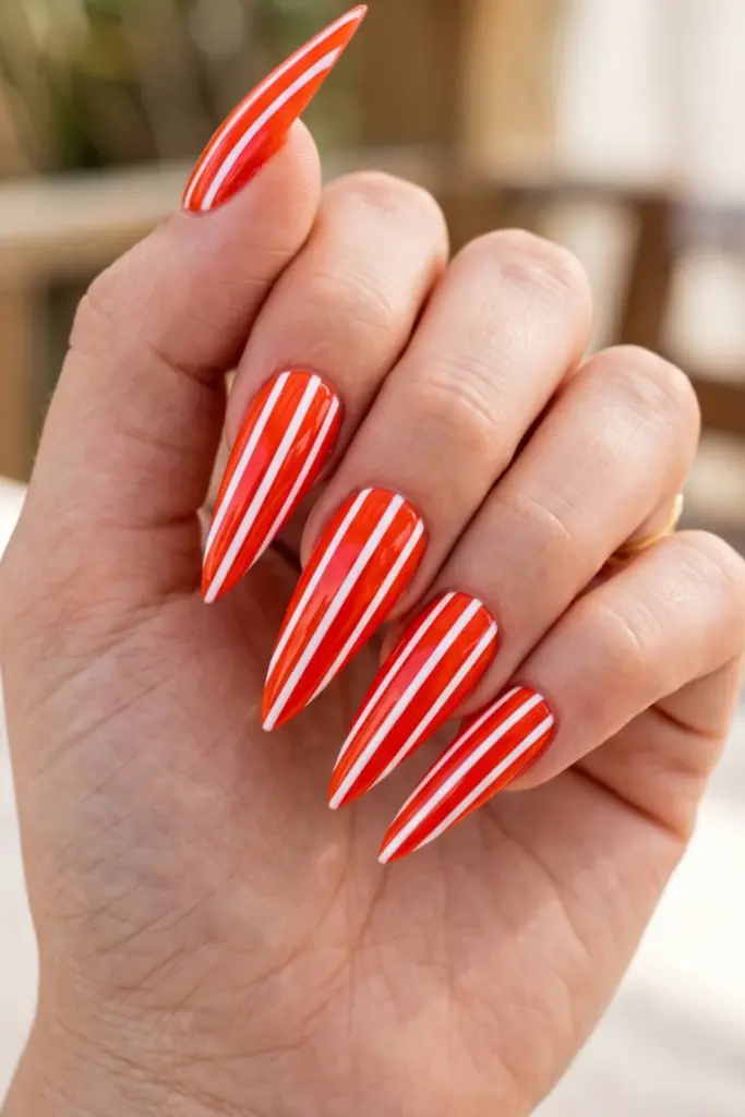 red-orange-white-stripes-stiletto-acrylic-summer-nail-design-ideas