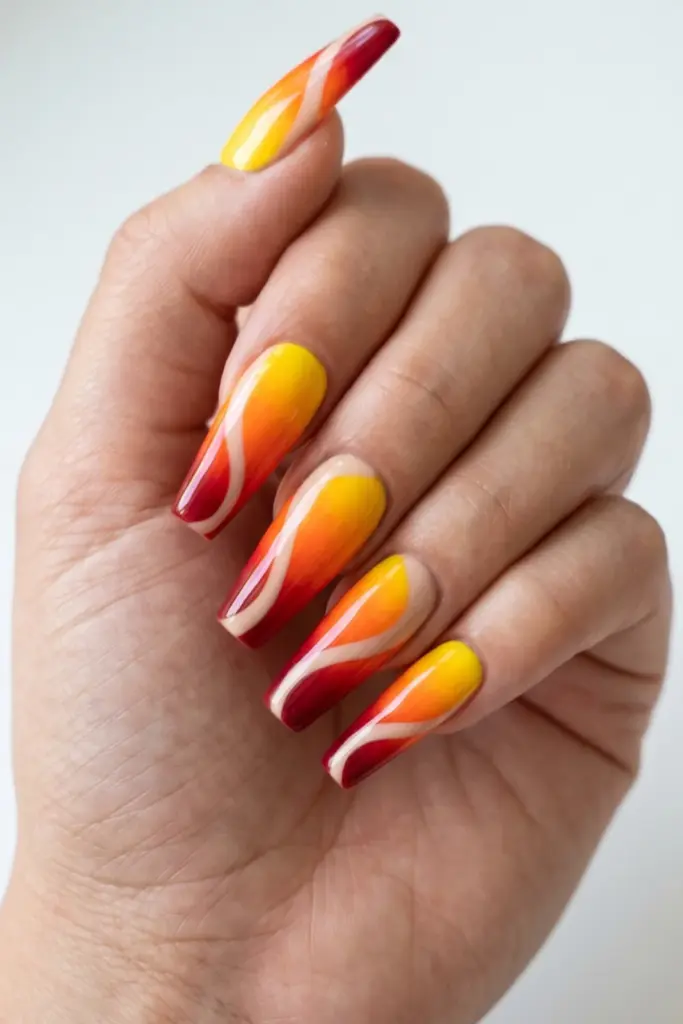 yellow-orange-red-flame-swirl-ombre-stunning-neon-abstract-swirl-acrylic-summer-nails-designs-ideas