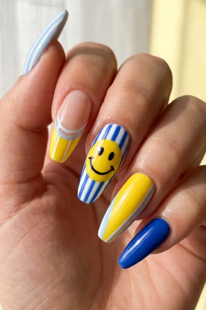 smiley-face-yellow-blue-stripes-girly-summer-nail-design-ideas