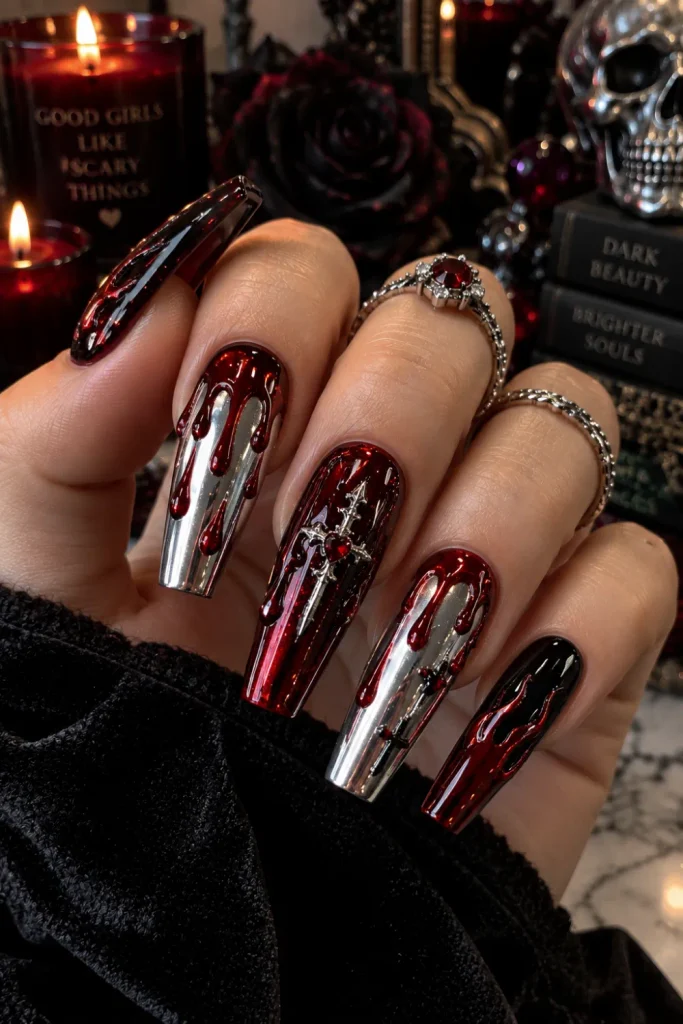 Edgy blood drip chrome chunky Halloween nails with mirror chrome, deep red 3D drips, black polish, and dramatic gothic detailing.