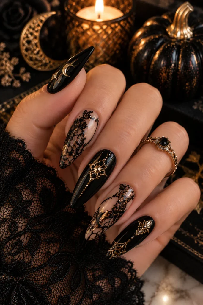 Elegant black lace and gold Halloween nails with delicate gothic detailing, luxury accents, and sophisticated 2026 styling.