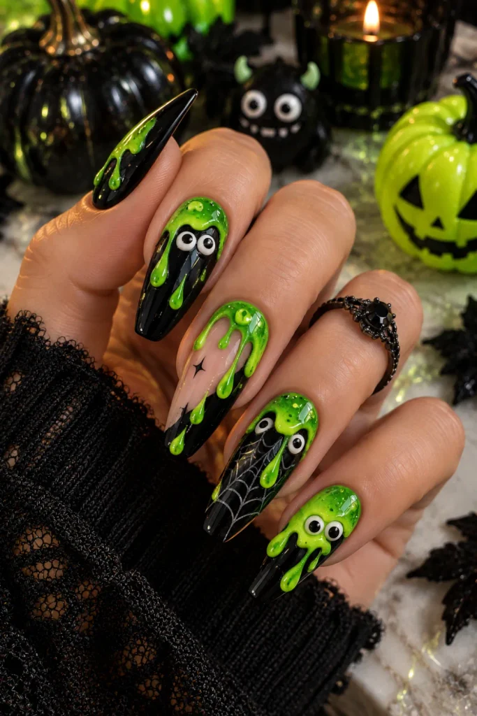 Vibrant green slime drip monster Halloween nails with glossy black accents and playful contemporary 2026 styling.